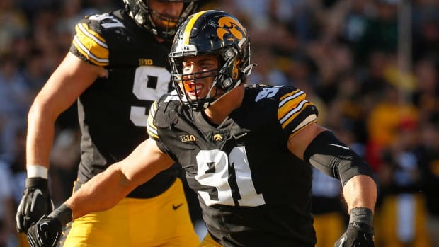 Iowa freshman defensive lineman Lukas Van Ness reacts after sacking Colorado State quarterback Todd Centeio in the third quarter at Kinnick Stadium in Iowa City, Iowa, on Saturday, Sept. 25, 2021.